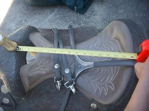 16 in Circle Y Western Saddle all carved with silver, breast plate and reins