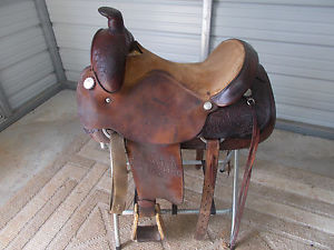 older 16" Circle Y trophy roping saddle with some tooling
