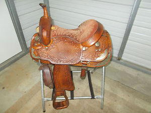 15 1/2" custom ordered Hereford Tex Tan saddle w/detailed tooling/silver trim