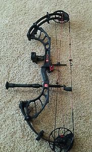 PSE EVO MAX.  25"~30" RH 60#~70# with ultra rest and Axion sights