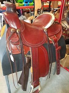 Ranch working saddle with breastplate and pulling harness