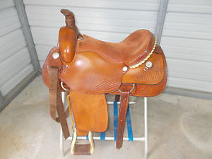 17" Dakota roping saddle with some tooling and big roping stirrups