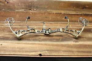 Bear Anarchy 70lb Draw Weight, 29" Draw Length, Realtree APG