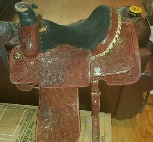 Custom tooled leather saddle