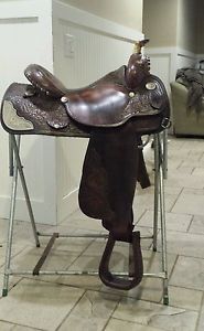 Circle y saddle 15 inch seat.beautiful tooling lots of Silver with jewels .nice!