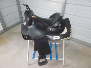 15"  Black Simco trail  saddle w/black smooth learther, silver kit and gel seat