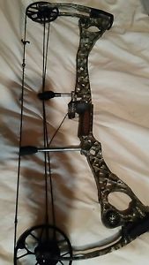mathews Lh, htr , 70lb , 28 draw , lost camo with qad rest