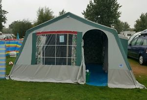 framed canvas tent and camping gear