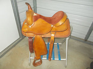16" Brown pleasure saddle by Dan Duade w/smooth leather and outlined w/tooling
