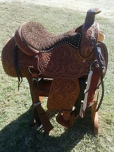 Vintage 16" Hereford Tex Tan roping saddle Handtooled sample. Never used rawhide