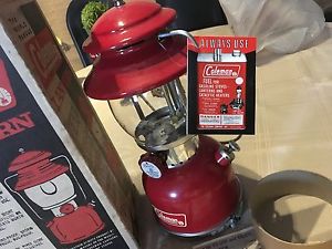 Vintage brand new model 200A195 Coleman lantern with original box lantern papers