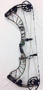 Obsession Defcon M6, RH, 29", 70 lb, Realtree Xtra