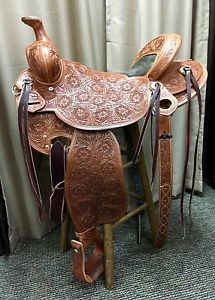 McCall Saddle. Western 16 inch-Round skirt. Lite Will James -Tooled padded seat