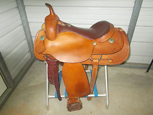 17" Showman cutting saddle with leather seat and some tooling