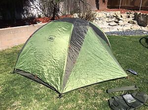 This is a used REI Half Dome 2+ Tent with a Footprint, all are lightly used