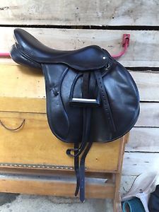 Jumping saddle, custom made by Heritage Saddlery UK, minimally used.