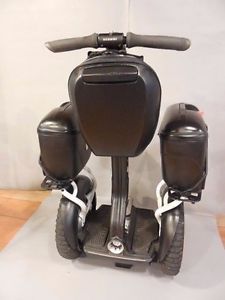 Segway i2 with Saddlebags, front headlight & rear tail-light, and knobby tires