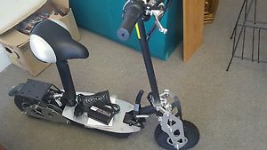 NEW 2016 Super Turbo LITHIUM 1200 watt CHROME Electric Scooter, floor model.