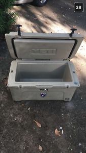 Yeti tundra 65' tan condition: used but looks close to new, 2 stickers