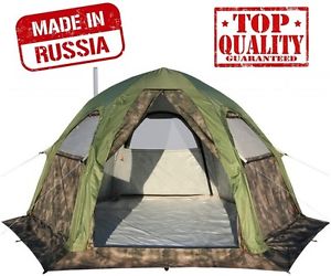 Living Camping Tent with Wood Stove. Outfitter Hunting Expedition Winter Arctic.