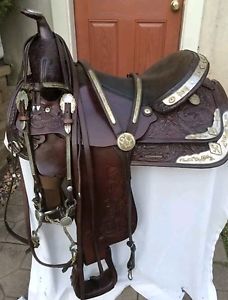 circle y saddle SQHB/ 16 seat/    LOTS OF SILVER
