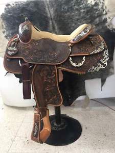 BLACK MATERIAL ON 17'' WITH TACK SET ON WESTERN LEATHER SADDLE