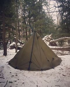 Seek Outside Tipi with Titanium Stove