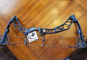 elite impulse 31 28" 60lb w/ elite qad rest