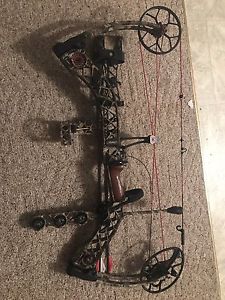 Used Mathews Creed XS 70#  RH Lost camo with sight, Rest And Quiver.