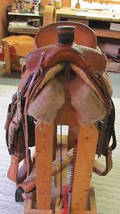 Shop made saddle by Tom Cobb Saddler.