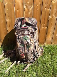 brand new badlands clutch backpack