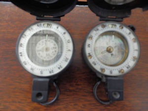 ONE ENBEECO PRISMATIC COMPASSES  shown on left ,other sold