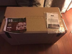 Canyon Outfitter 55 Qt Cooler Sandstone with 2 64oz Growlers
