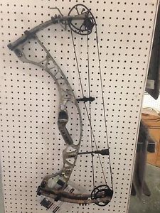 2013 Hoyt Spyder 30...27 inch, 60 pound, camo, new with tags. Valued at $899.