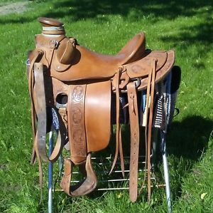 15" WADE roping/trail saddle by JC Martin. Excellent used condition.