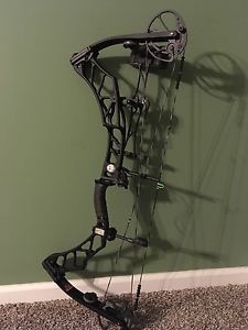 Elite impulse 31 RH ninja 65# 28" draw
